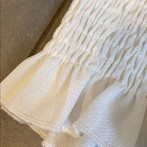 A white ruffled shirt